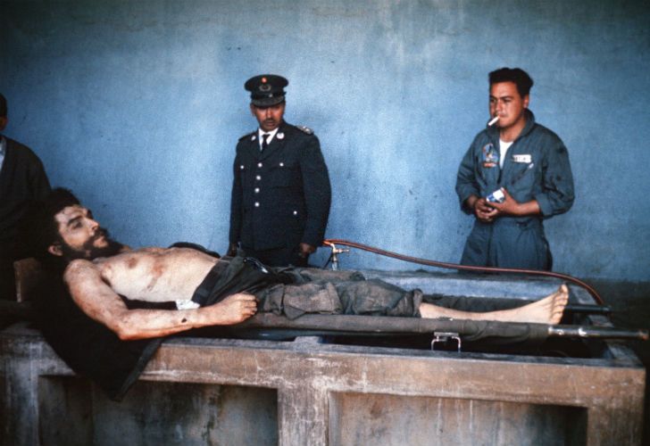 Picture taken on October 10, 1967 by AFP journalist Marc Hutten of the body of Argentine-born guerrilla leader Ernesto "Che" Guevara being exposed on a laundry sink in the village of Vallegrande, Bolivia. Guevara was executed upon capture on the eve in La Higuera, 74 km from Vallegrande and taken to Vallegrande to be publicly exposed. MARC HUTTEN / AFP