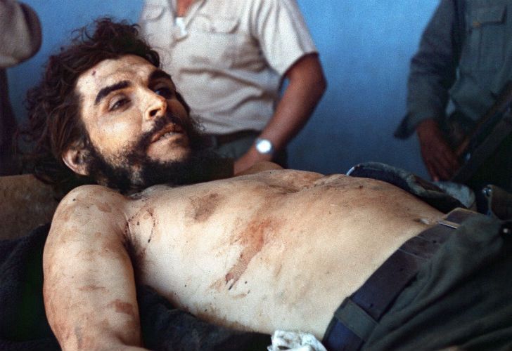 Picture taken on October 10, 1967 by AFP journalist Marc Hutten of the body of Argentine-born guerrilla leader Ernesto "Che" Guevara being exposed on a laundry sink in the village of Vallegrande, Bolivia. Guevara was executed upon capture on the eve in La Higuera, 74 km from Vallegrande and taken to Vallegrande to be publicly exposed. MARC HUTTEN / AFP