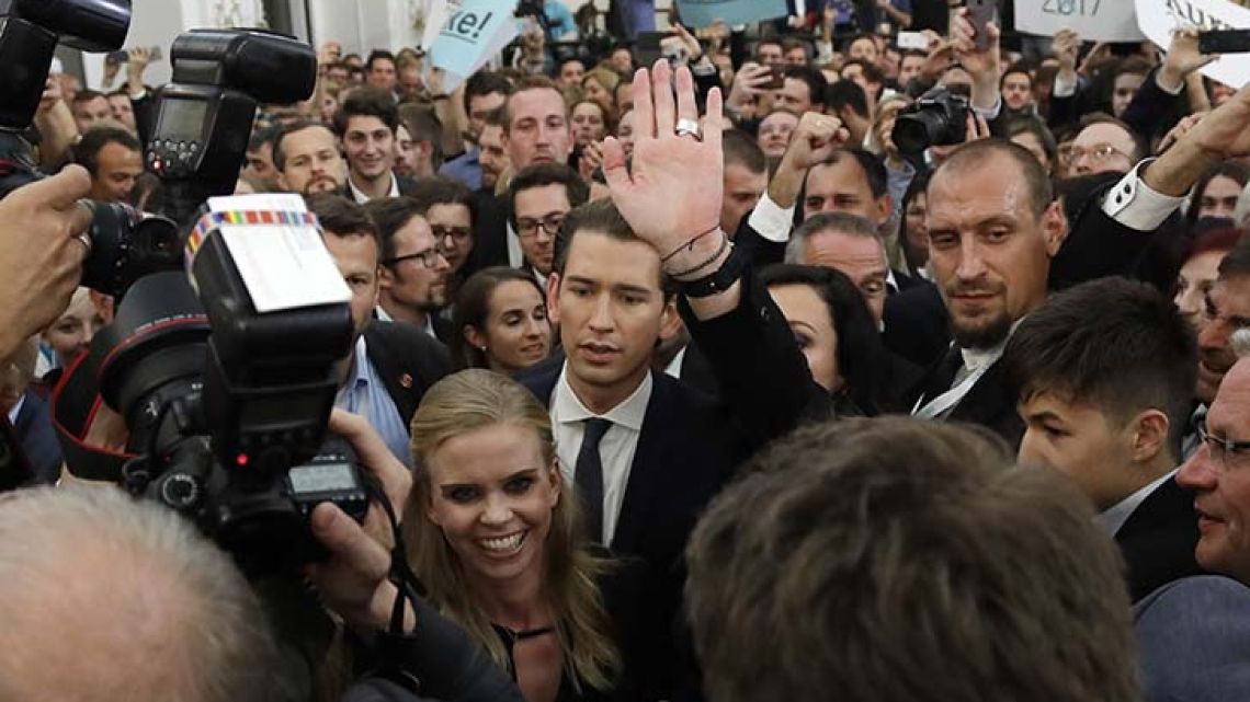 Foreign Minister Sebastian Kurz, head of Austrian People's Party, arrives to the election party in Vienna, Austria, Sunday, Oct. 15, 2017, after the closing of the polling stations for the Austrian national elections.