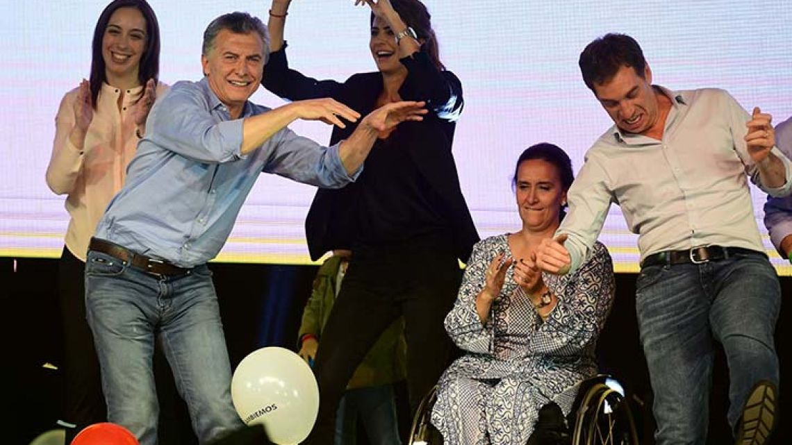 Argentina's President Mauricio Macri (2-L) dances with his wife Juliana Awada (C), Argentina's Vice President Gabriela Michetti (2-R) Buenos Aires Governor Maria Eugenia Vidal (L) and Buenos Aires vice-major Diego Santilli during celebrations last night.