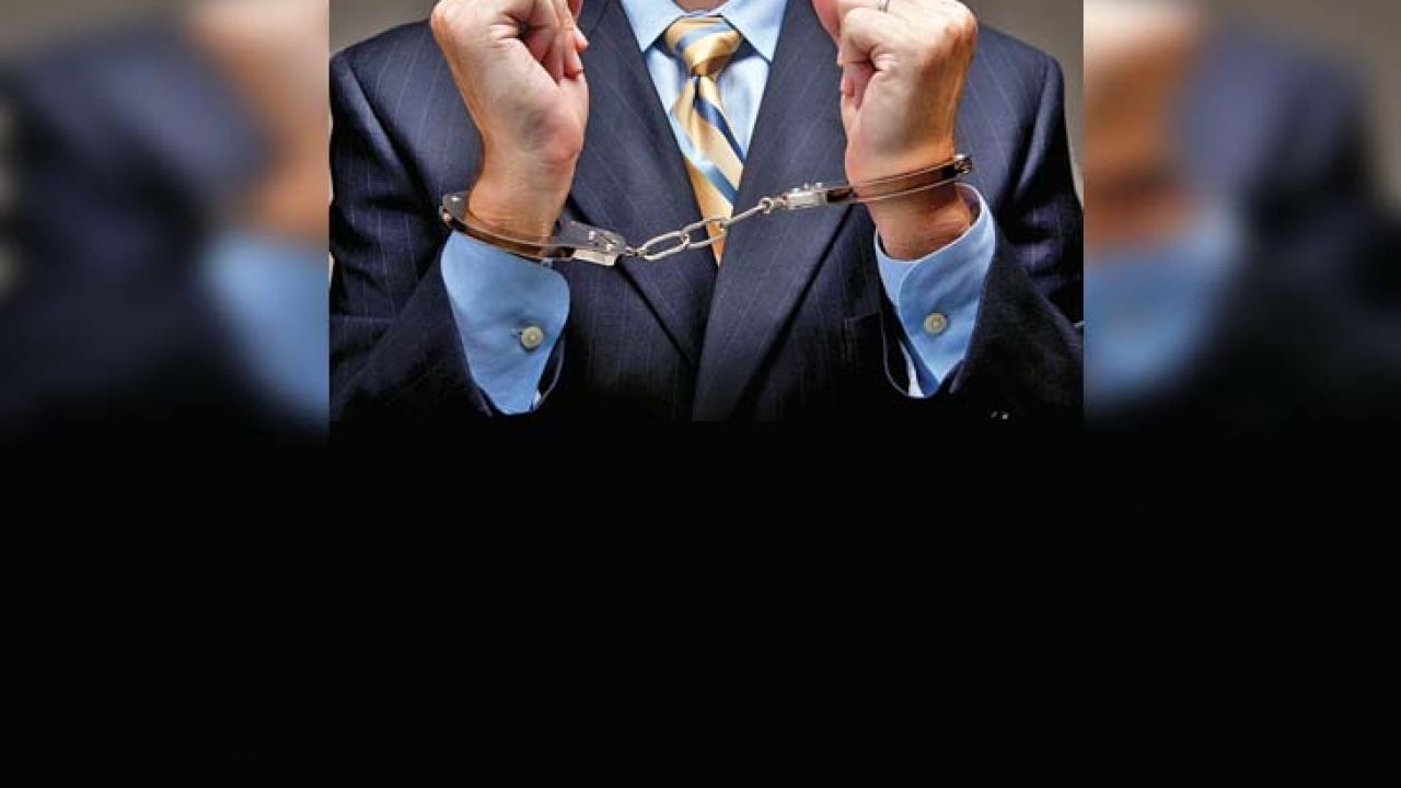 business-man-in-handcuffs