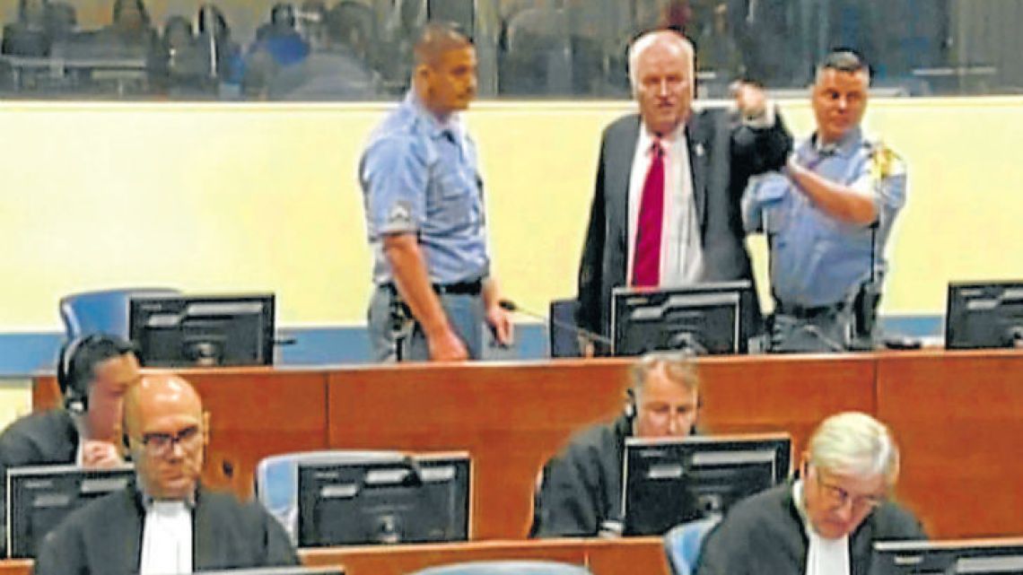 Bosnian Serb wartime military chief Ratko Mladic yells angrily during his trial by the International Criminal Tribunal for the former Yugoslavia.