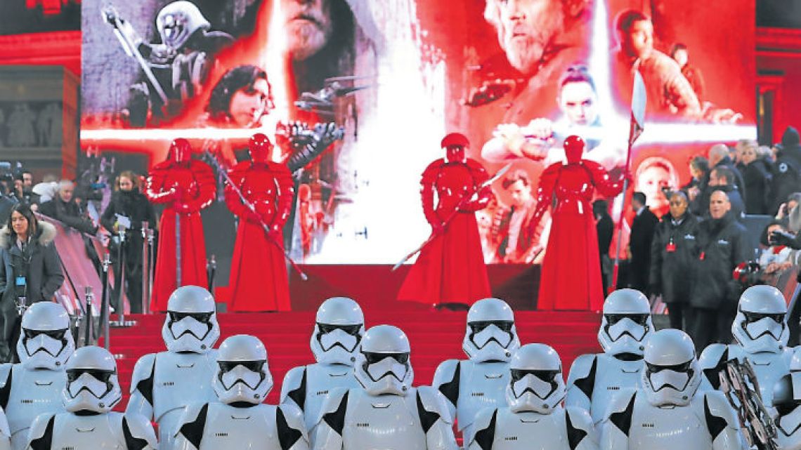 Stormtrooopers and Praetorian guards pose on the red carpet for the European Premiere of Star Wars: The Last Jedi at the Royal Albert Hall in London on Tuesday.