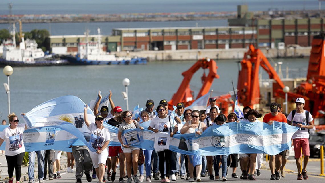 Families of the 44 crew members of the submarine ARA San Juan march on the naval base in Mar del Plata on Friday, marking one month since the disappearance of the vessel. 