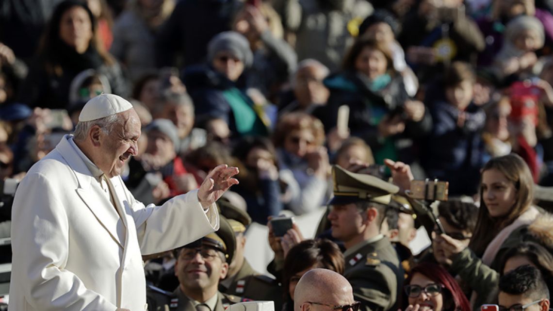 Pope Francis arrives for his weekly general audience, in St. Peter's Square, at the Vatican.