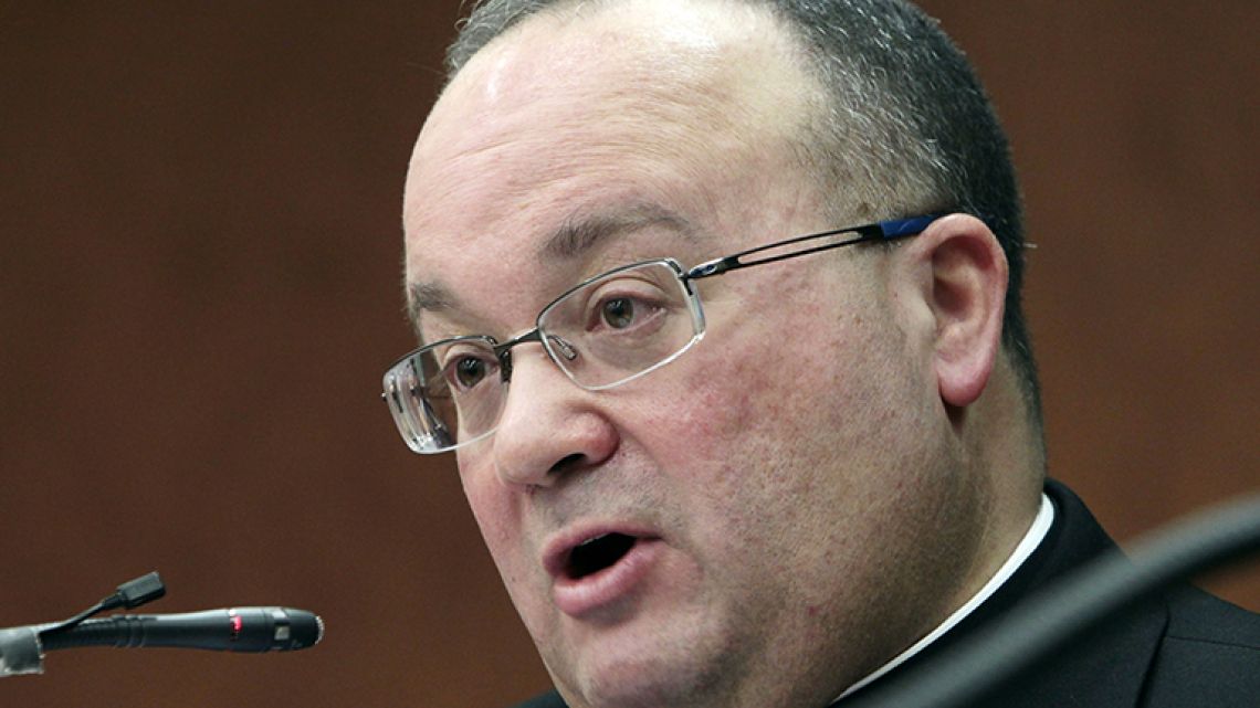 In this February 8, 2012 file photo Monsignor Charles Scicluna, the Vatican's top sex crimes expert, meets journalists in Rome. 