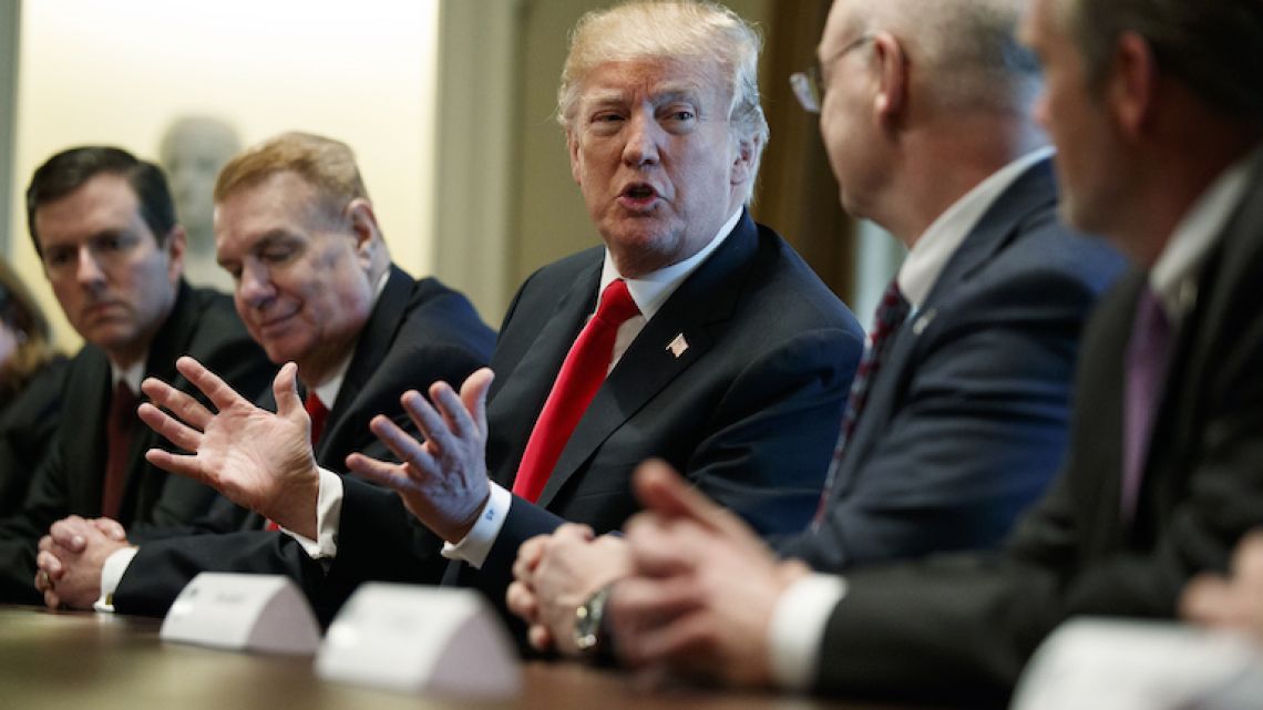 US President Donald Trump speaks during a meeting with steel and aluminum executives in the Cabinet Room of the White House on Thursday.