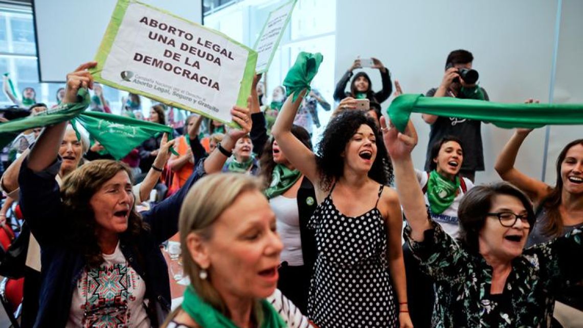 Activists cheer in favour of legalised abortion during the presentation of the abortion reform bill at Congress. Under heavy pressure by women's groups that have taken to the streets in large numbers in recent years, over 70 legislators presented an abortion bill that will be first be discussed in several committees of the lower chamber.
