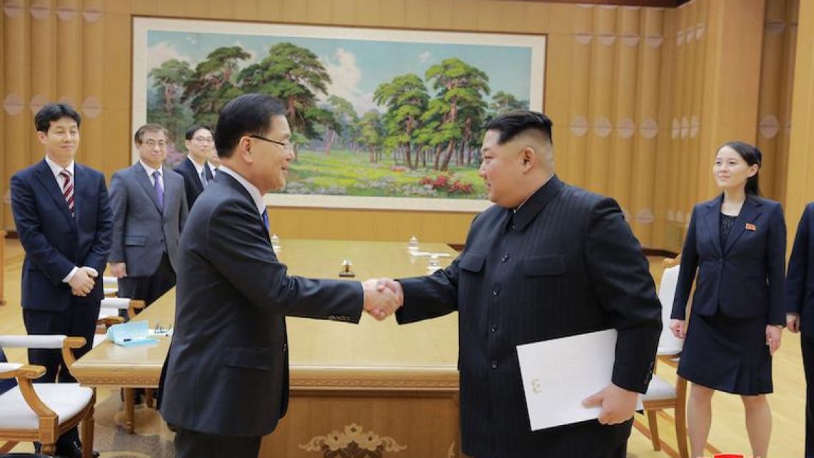 North Korean leader Kim Jong Un, front right, shakes hands with South Korean National Security Director Chung Eui-yong after Chung gives Kim a letter from South Korean President Moon Jae-in, in Pyongyang on Monday. Image provided by North Korean state media.
