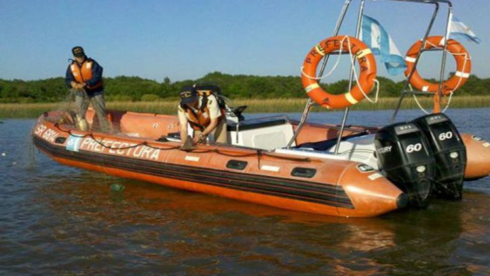 Buscan a un joven en las aguas del río Luján