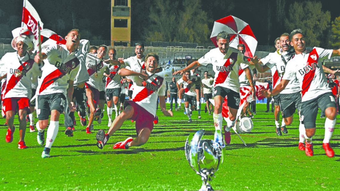 River Plate’s players celebrate winning the Supercopa Argentina 2018, after defeating Boca Juniors in the final at the Malvinas Argentinas stadium in Mendoza on Wednesday night.
