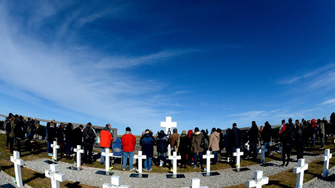 Relatives visit the final resting place of fallen Argentine soldiers on the Malvinas (Falklands) Islands.