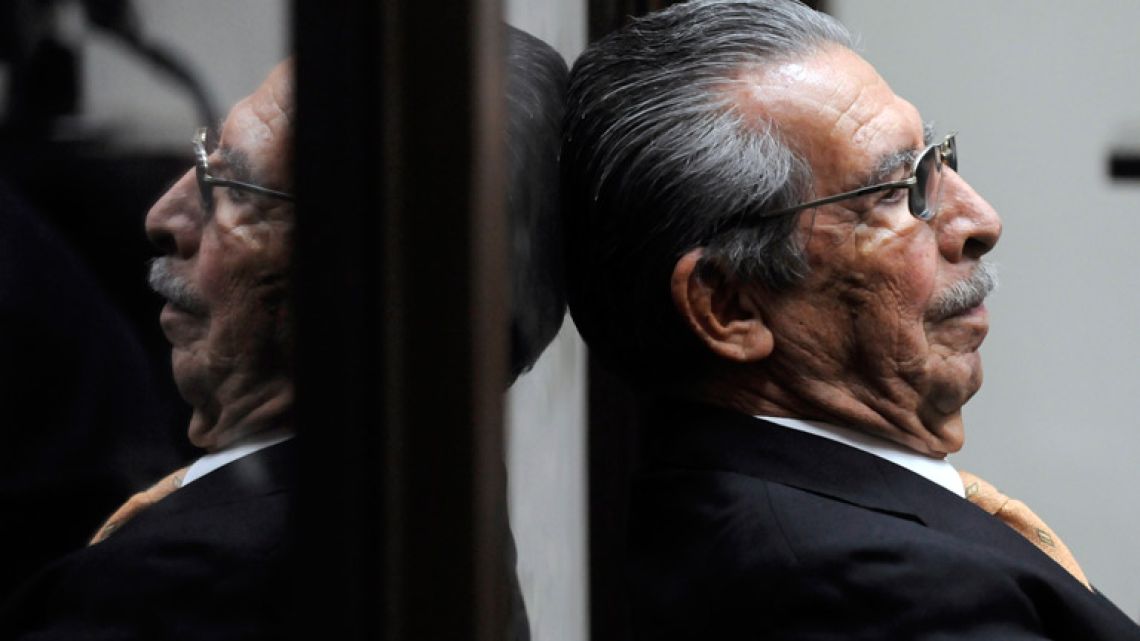 In this file picture taken on January 31, 2013, former Guatemalan de facto president and retired General Jose Efrain Rios Montt sits during a court hearing in Guatemala City. Efrain Rios Montt, a former military dictator who ruled Guatemala between 1982 and 1983 and who was facing retrial on genocide charges, died Sunday aged 91.