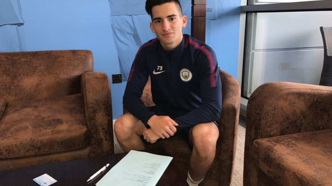 Benjamin Garre is pictured after signing his first contract with English club Manchester City.