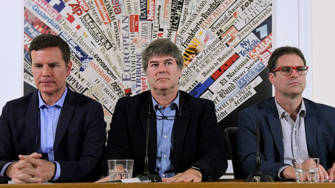 Chilean sexual abuse victims José Andres Murillo (right), James Hamilton (centre) and Juan Carlos Cruz (left), hold a news conference at the Foreign Press Association in Rome.