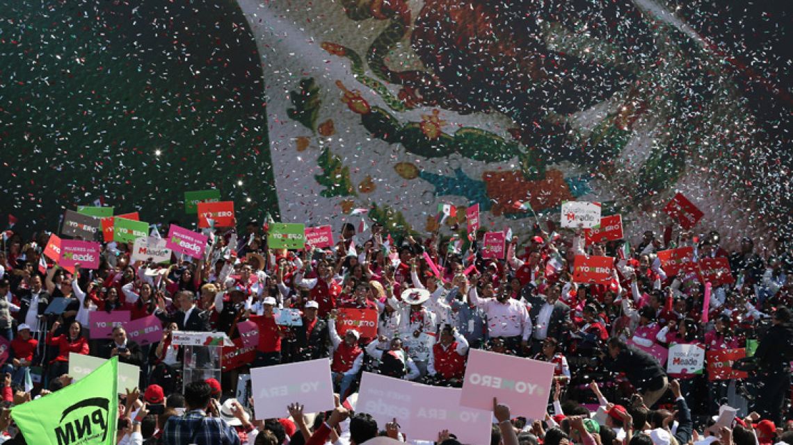 Confetti falls at the end of a Institutional Revolutionary Party, PRI, event in Mexico City. The PRI, Mexico’s ruling party, changed its leadership Wednesday, at a time the party is lagging badly in polls on the July 1 presidential race.