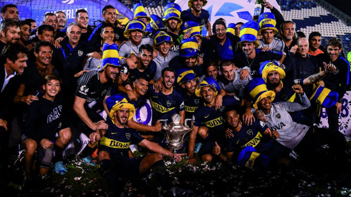 The full Boca Juniors squad celebrates winning the Superliga with a 2-2 draw against Gimnasia in La Plata, before making the trip over to the Bombonera to celebrate with their fans.