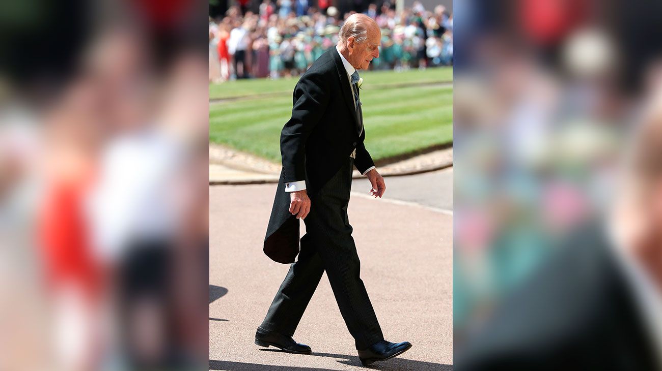  El príncipe Harry de Gran Bretaña, duque de Sussex (L) y prometida estadounidense del príncipe Harry Meghan Markle se unen para su boda en la Capilla de San Jorge, en el Castillo de Windsor