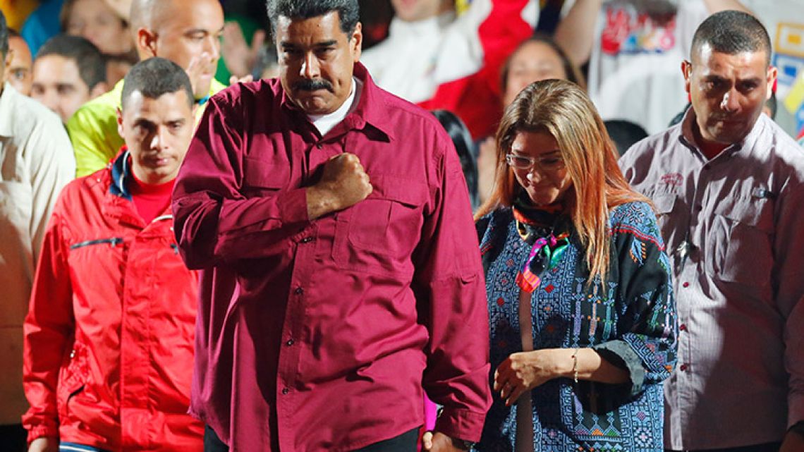 Venezuela's President Nicolas Maduro arrives to address supporters at the presidential palace after his May 20, 2018 election win.