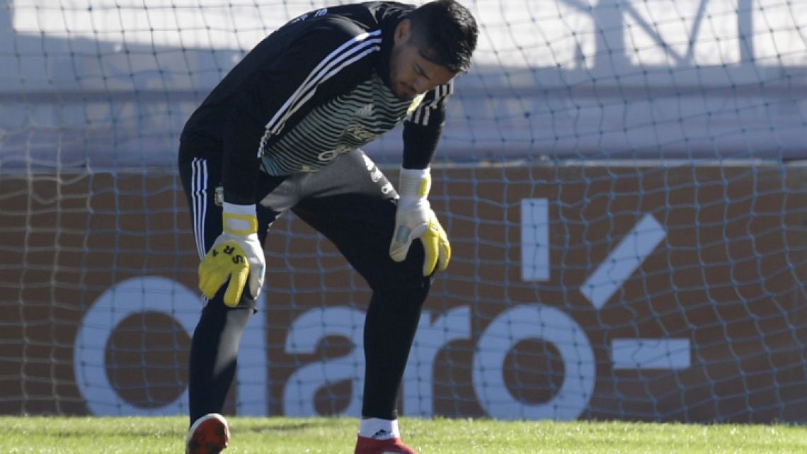 Sergio Romero stretches during a training session in Ezeiza. The Manchester United goalkeeper injured his right knee during a training session on Tuesday and will miss the FIFA 2018 World Cup starting next month in Russia. 