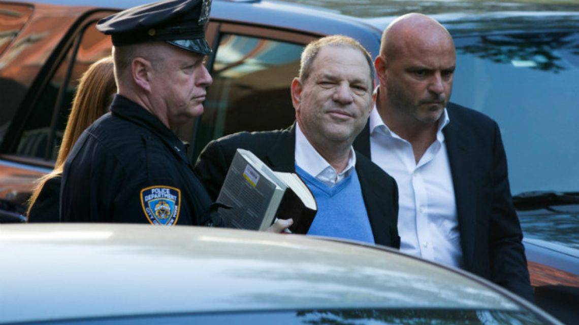 Harvey Weinstein turns himself in to the New York Police Department’s First Precinct after be served with criminal charges.