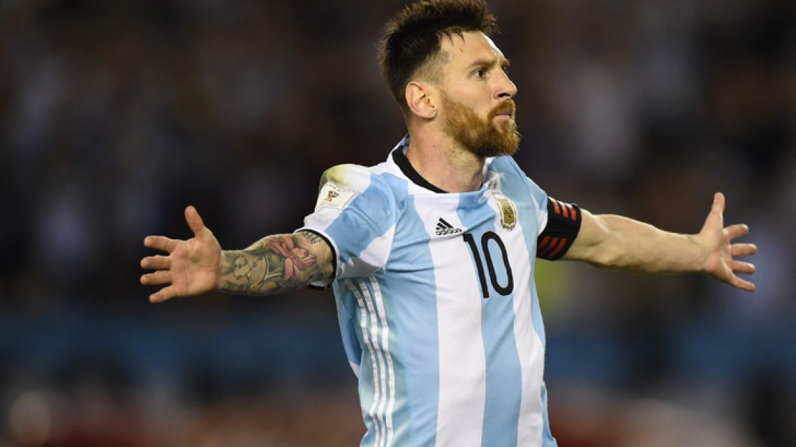 Lionel Messi celebrates after scoring against Chile during their 2018 FIFA World Cup qualifier football match at the Monumental last year.