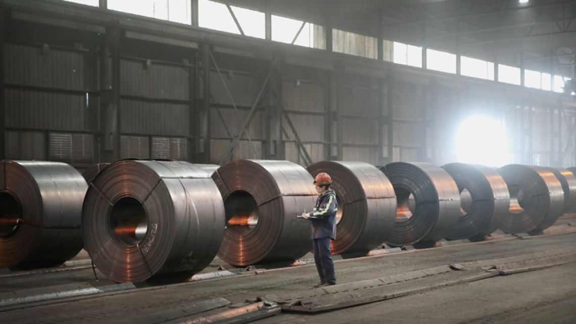 Steel coils produced at the NLMK Indiana steel mill are prepared for shipping in Portage, Indiana.