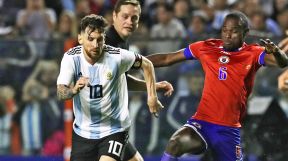 0602_messi_haiti_afp_g.jpg