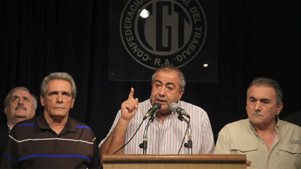 Juan Carlos Schmid, Héctor Daer y Carlos Acuña, en la sede de la CGT