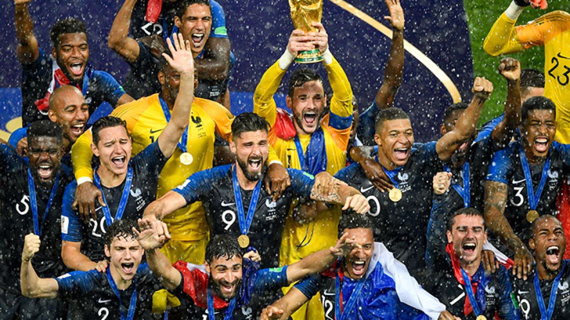 Captain Hugo Lloris holds the World Cup trophy aloft as France celebrate winning the title, after defeating Croatia 4-2 at the Luzhniki Stadium in Moscow on July 15, 2018.  