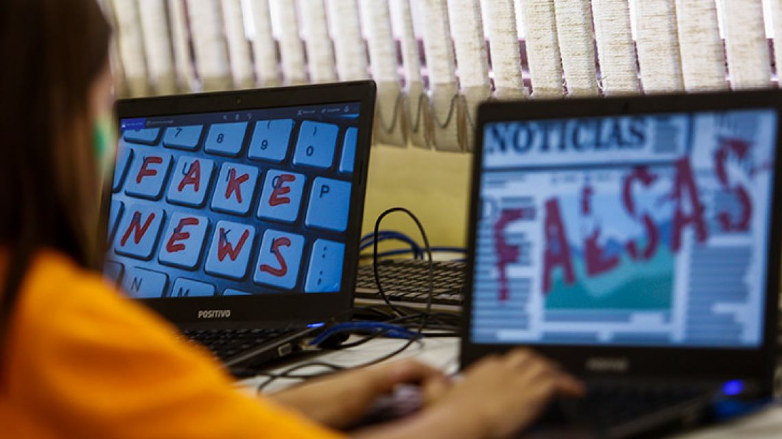 Students of Unified Educational Centres (CEU) attend a lesson on 'Fake News: access, security and veracity of information', in São Paulo, Brazil.
