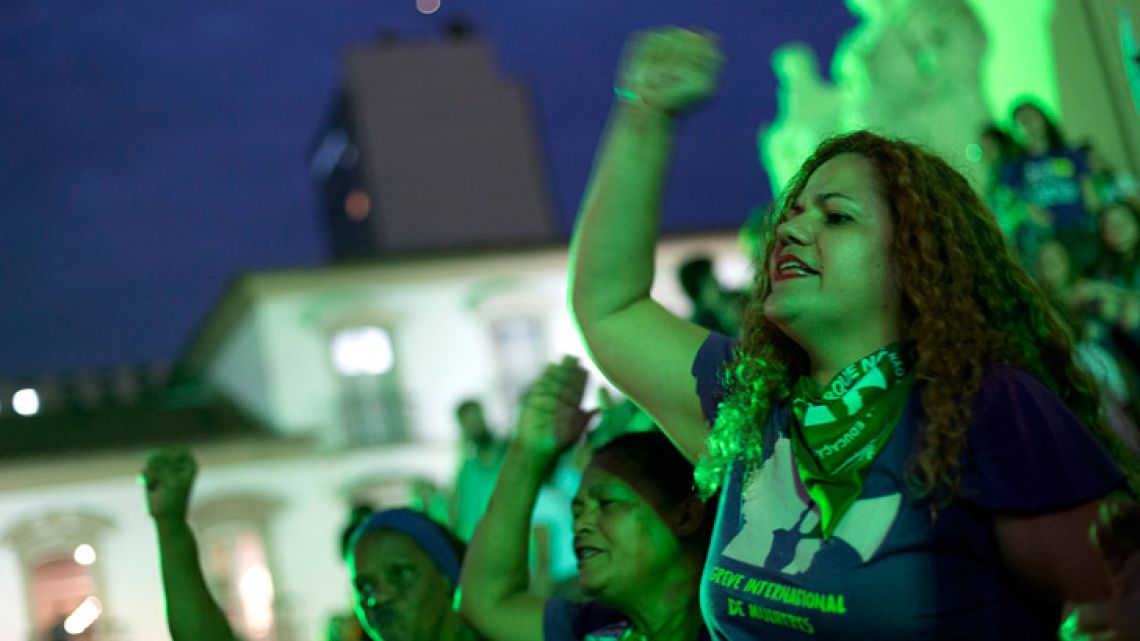 In this June 2018 photo, women take part in a protest demanding the legalisation of abortion, in Rio de Janeiro, Brazil. Supporters and opponents of legalising abortion began testifying on Friday in front of Brazil's top court, which is holding two days of extraordinary hearings on the issue.