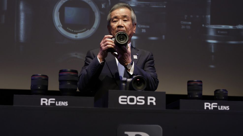 Masaya Maeda holds a Canon EOS R during an event in Tokyo