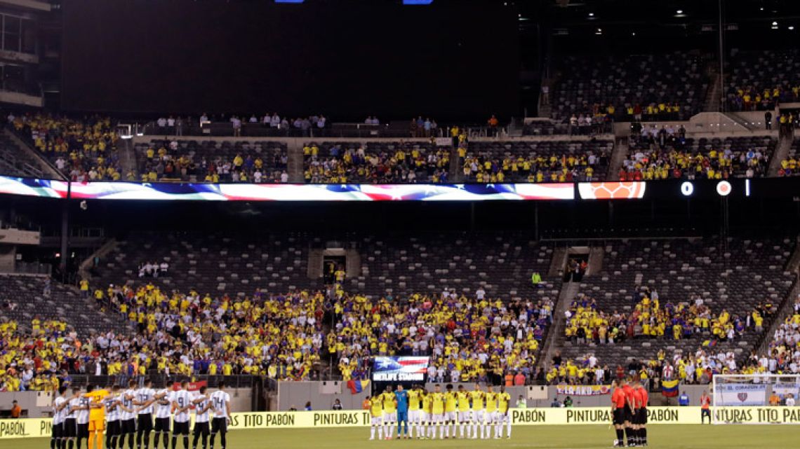 Argentina and Colombia players pause for a minute of silence in remembrance of the victims of the September 11, 2001, terrorist attacks prior to an international friendly match on Tuesday, September 11, 2018, in East Rutherford. The teams drew 0-0. 