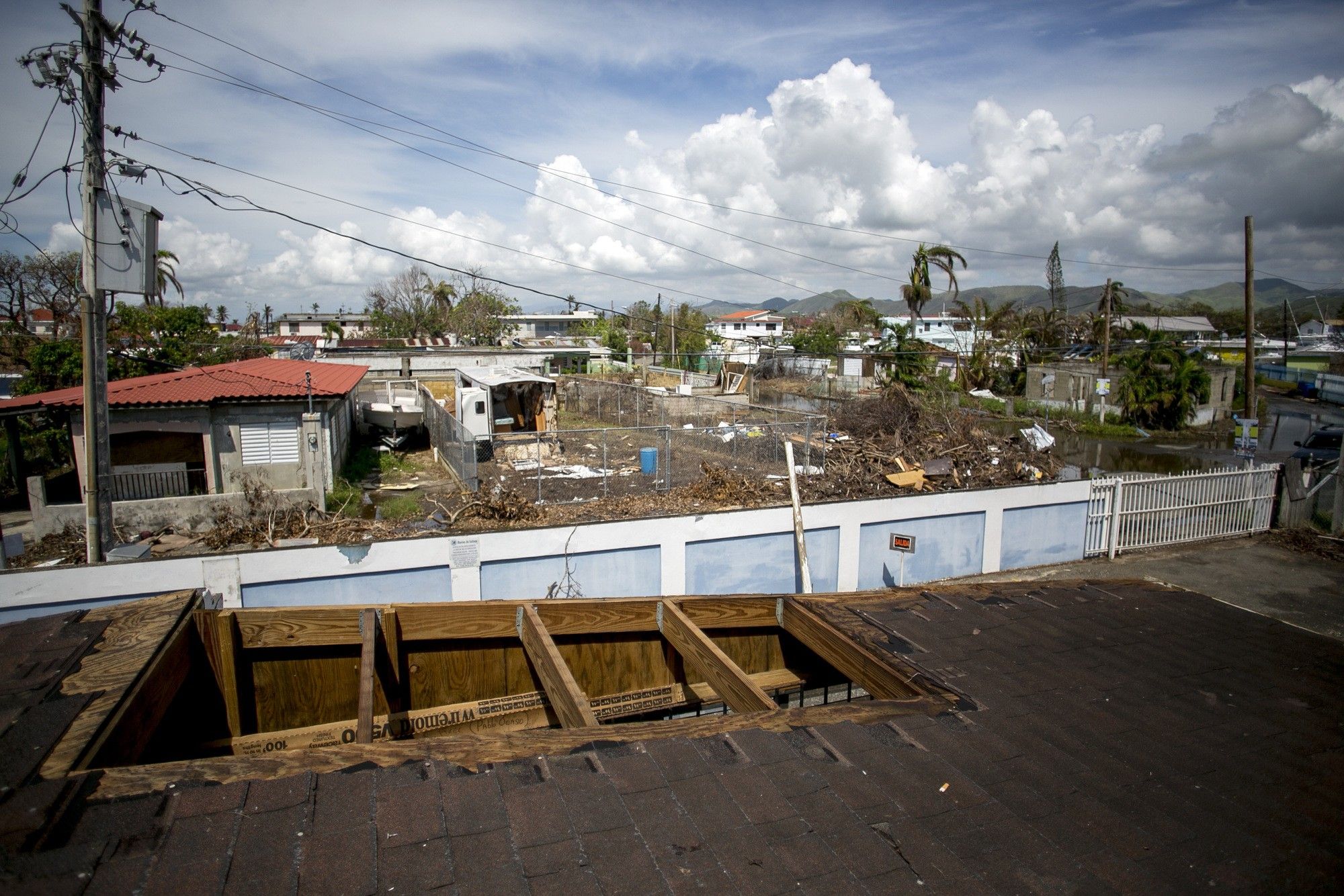 Puerto Rico Struggles With Loss Two Weeks After Hurricane As Tourism Workers Are Rushing to Fill Recovery Jobs 