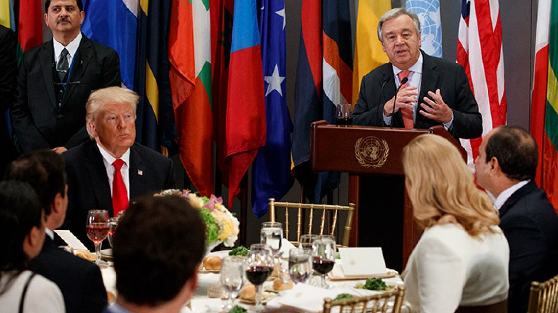 US President Donald Trump listens as United Nations Secretary General António Guterres speaks during a working lunch at the United Nations General Assembly.