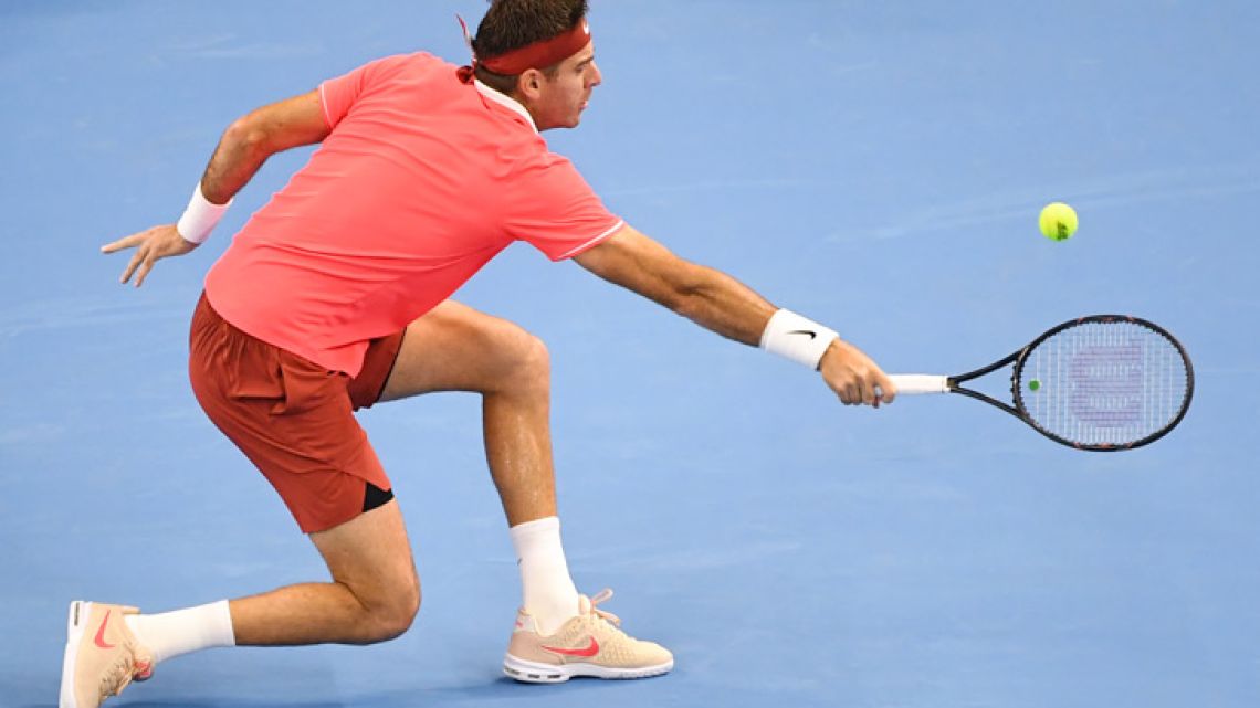 Juan Martín del Potro reaches for a return during his men's singles second round match against Karen Khachanov of Russia at the China Open tennis tournament in Beijing on October 3, 2018.