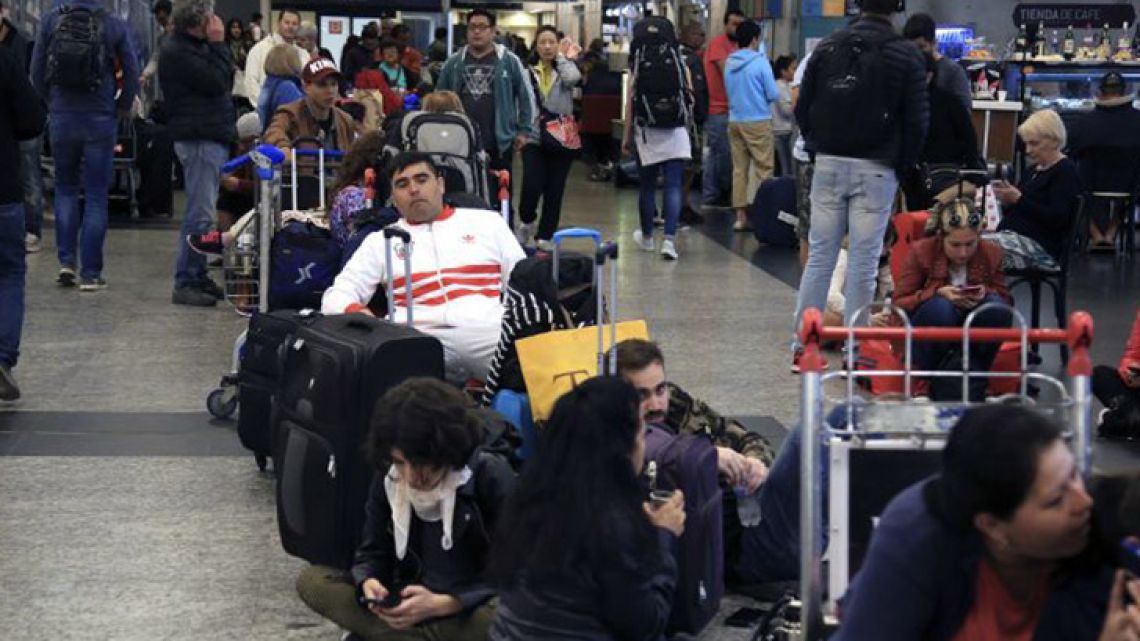 Passengers await news at Aeroparque Jorge Newbery.