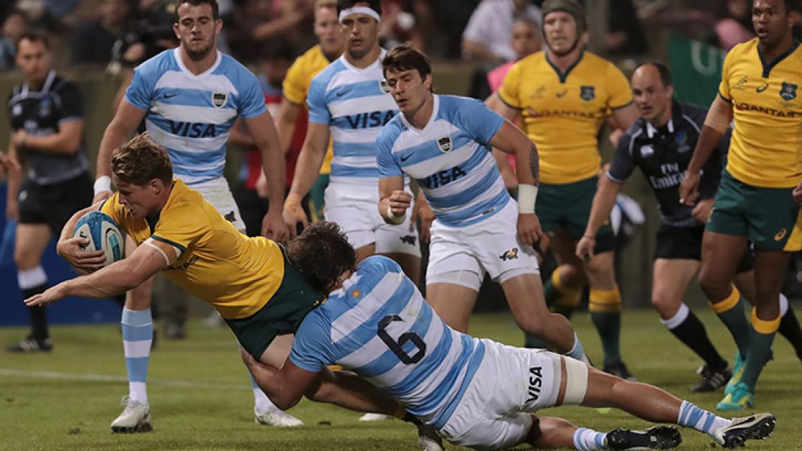 Argentina's Pablo Matera (number 6) can't stop Australia's Michael Hooper from scoring a try during their Rugby Championship match in Salta, Argentina, Saturday, October 6, 2018.