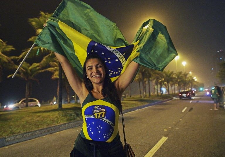 "Grieta". Brasil vivió una jornada electoral marcada por los festejos de los bolsonaristas y la desazón de los partidarios del PT. A ambos lados, la particular alegría y el inconmovible color brasileños