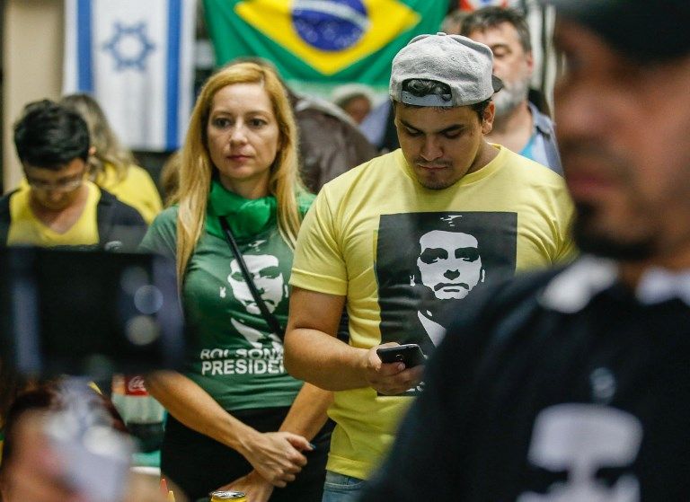 "Grieta". Brasil vivió una jornada electoral marcada por los festejos de los bolsonaristas y la desazón de los partidarios del PT. A ambos lados, la particular alegría y el inconmovible color brasileños