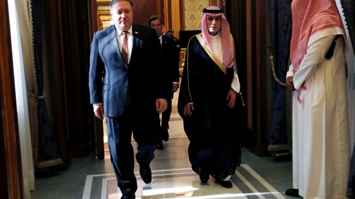 US Secretary of State Mike Pompeo walks with Saudi Foreign Minister Adel al-Jubeir in Riyadh, Saudi Arabia, on Tuesday.