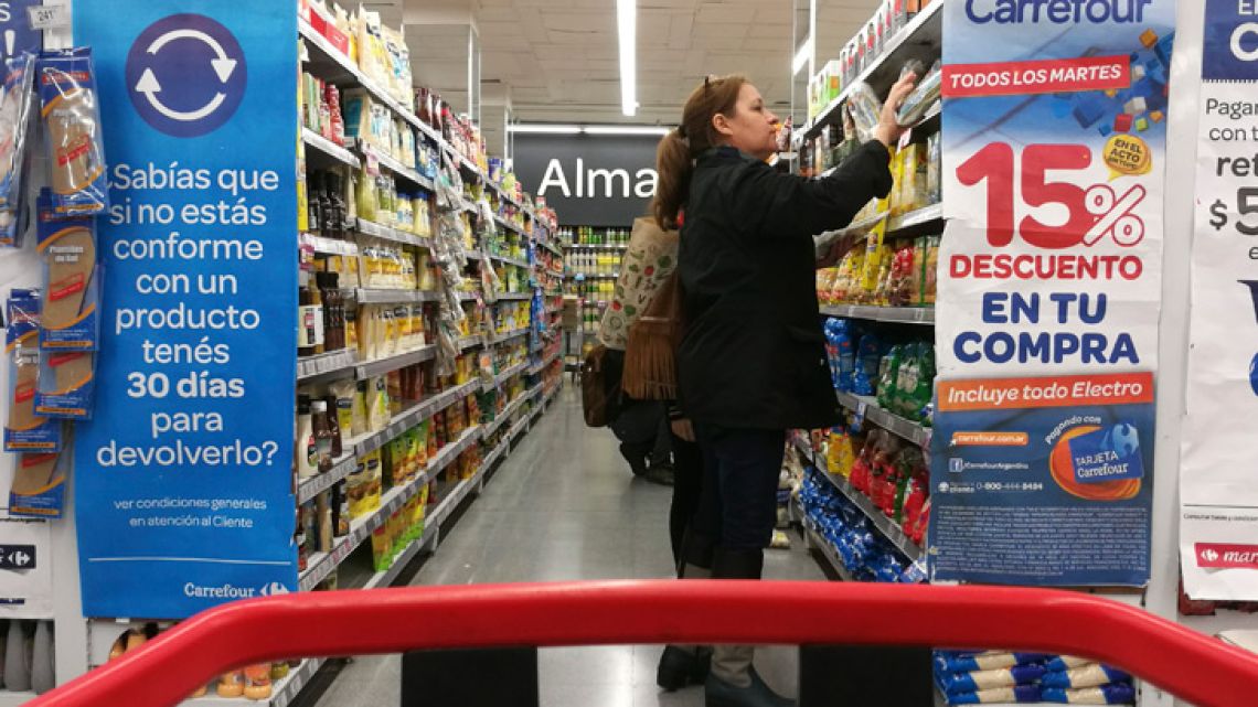 A woman shops at a supermarket in Buenos Aires.