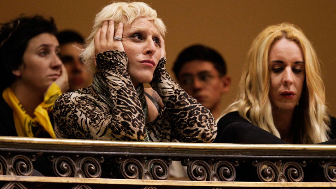 Activists listen to legislators during a session in which the Integral law for Trans People in Montevideo, Uruguay.
