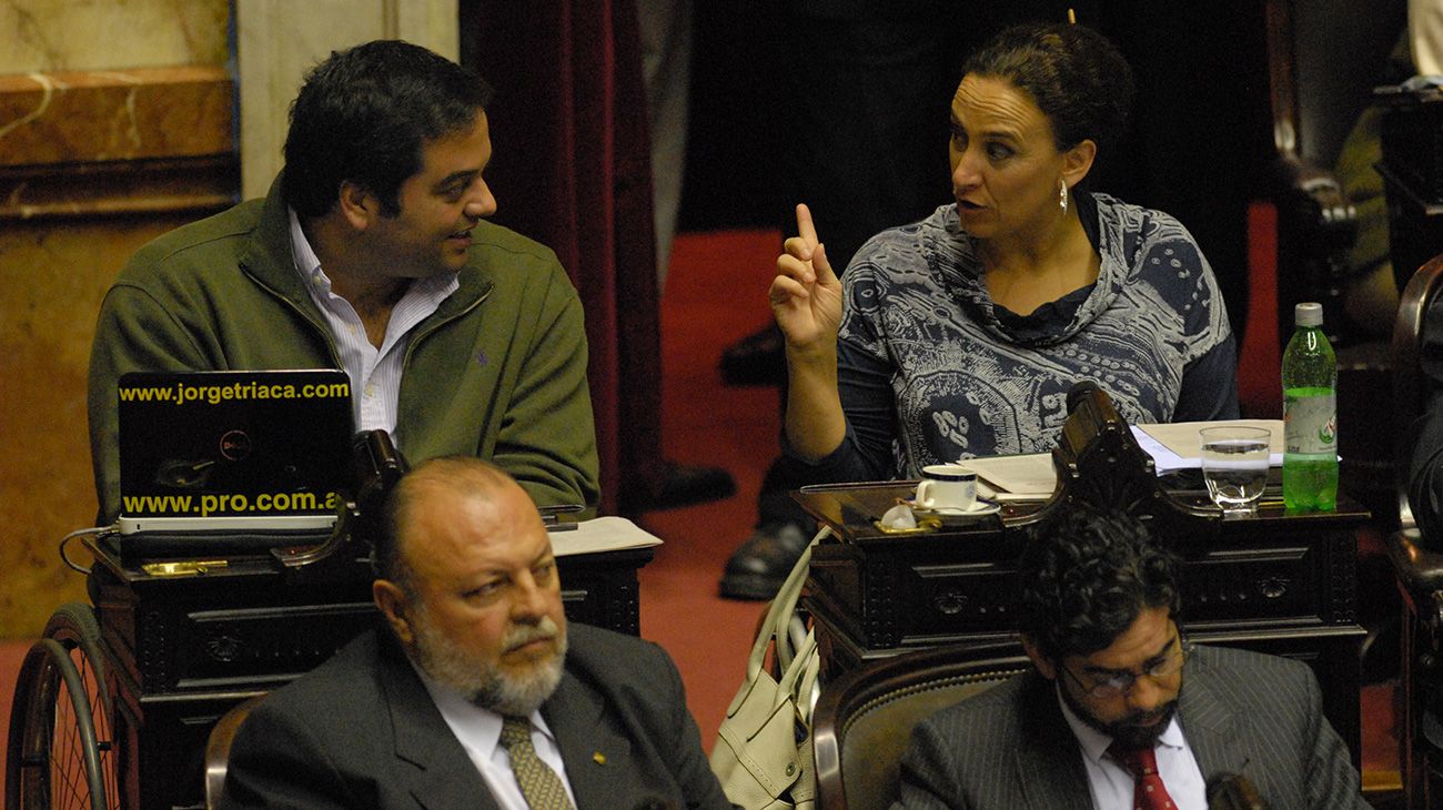 Jorge Triaca en su época de legislador junto a Gabriela Michetti.