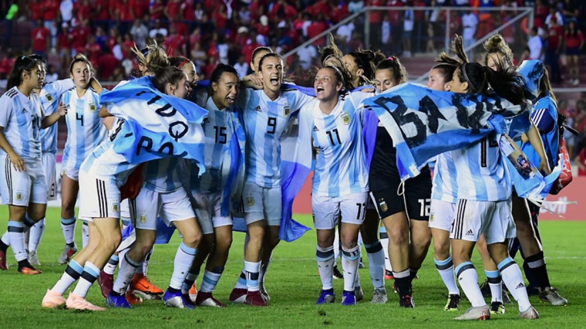 Argentina's players celebrate achieving World Cup qualification, after drawing with Panama at the Romel Martínez Stadium in Panama City.