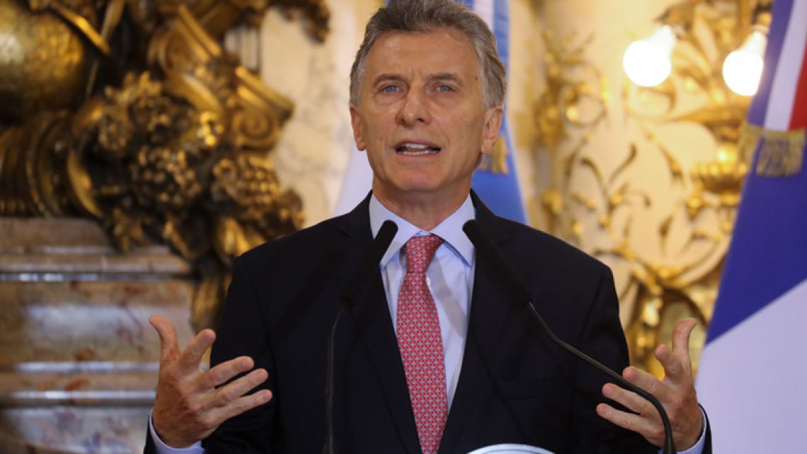 President Mauricio Macri speaks during a press conference at Casa Rosada presidential house in Buenos Aires.