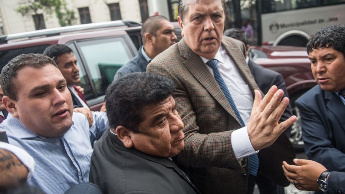 Peruvian former president Alan Garcia arrives at the prosecutor office in Lima on Nov. 15, 2018. 