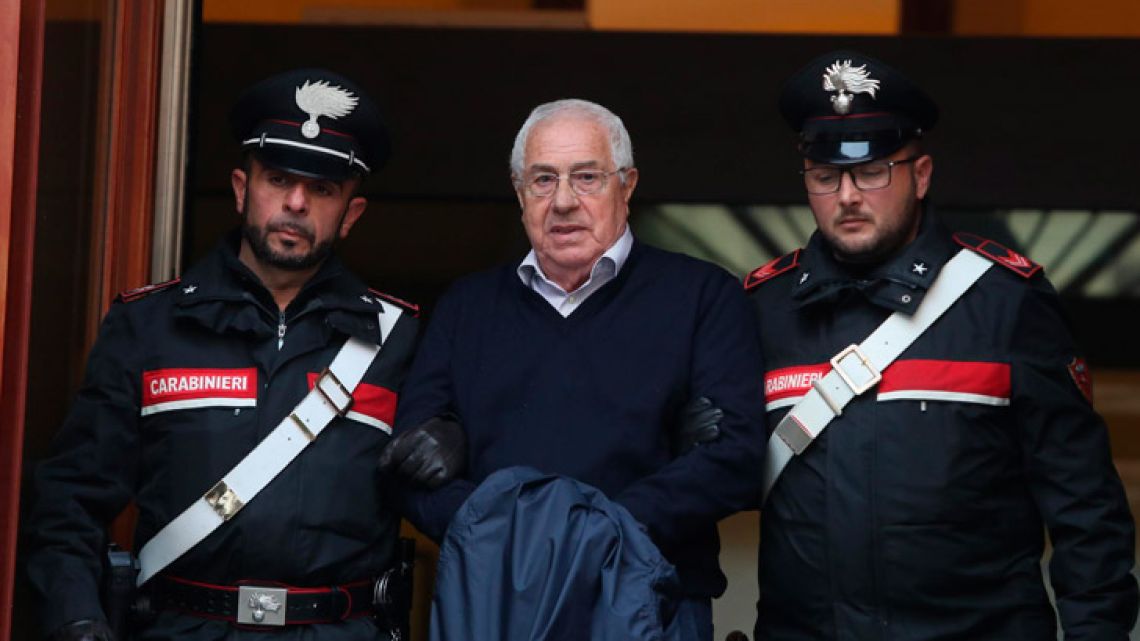 Settimo Mineo, who allegedly took over as the Palermo head of Cosa Nostra, is escorted by Italian Carabinieri police.
