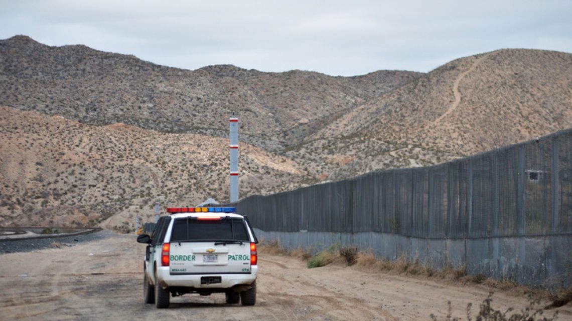 A US Border Patrol agent patrols Sunland Park along the US-Mexico border next to Ciudad Juarez.
